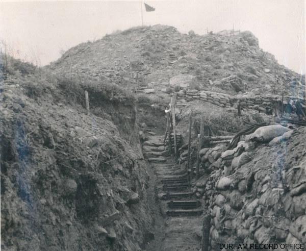 DLI flag flying from the top of Point 355 ‘Little Gibraltar’, April – July 1953. Image © Durham Record Office (D/DLI 2/1/21(55))